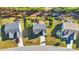 An aerial view of the house and neighborhood showcasing the roofline and landscaping from above at 217 Astoria Park Loop, Conway, SC 29526