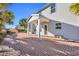 A large backyard with a brick patio and palm trees that provides space for outdoor enjoyment and gatherings at 217 Astoria Park Loop, Conway, SC 29526