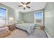 Calming bedroom with soft green walls, natural light, and carpeted floor at 217 Astoria Park Loop, Conway, SC 29526