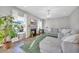 Cozy living room featuring a fireplace, plush seating and soft lighting at 217 Astoria Park Loop, Conway, SC 29526