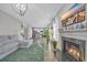 Open-concept living room flows into a modern kitchen at 217 Astoria Park Loop, Conway, SC 29526