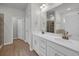 Bathroom featuring a double sink vanity with white cabinets and modern fixtures at 240 Palmetto Sand Loop, Conway, SC 29527