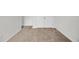 Hallway with neutral carpet and white trim, and multiple doors at 240 Palmetto Sand Loop, Conway, SC 29527