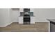 Close up of a modern stainless steel oven and cooktop in a kitchen with stylish backsplash at 240 Palmetto Sand Loop, Conway, SC 29527