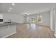 Spacious living space with hardwood floors, granite countertops, and natural light at 240 Palmetto Sand Loop, Conway, SC 29527