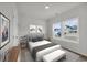 Well lit bedroom with bed, side tables, bench, and decor at 240 Palmetto Sand Loop, Conway, SC 29527