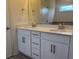 Bathroom with double sinks and modern fixtures with a large mirror at 300 Palmetto Sand Loop, Conway, SC 29527