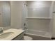 Clean bathroom features tiled walls, a bathtub with shower, and a modern vanity at 300 Palmetto Sand Loop, Conway, SC 29527