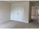 Bright bedroom with neutral carpet and large closet, enhancing space and storage at 300 Palmetto Sand Loop, Conway, SC 29527