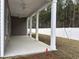Covered patio with sturdy columns, providing a comfortable outdoor living space at 300 Palmetto Sand Loop, Conway, SC 29527