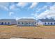 Exterior view of a home with a covered patio and a spacious backyard at 432 Hallie Martin Rd., Conway, SC 29527