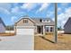 Beautiful single Gathering home featuring a charming design with a two-car garage at 432 Hallie Martin Rd., Conway, SC 29527