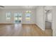 Spacious living room showcasing wood floors, large windows, and natural light at 432 Hallie Martin Rd., Conway, SC 29527