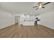 Bright and airy living room with wood floors and an open kitchen concept at 432 Hallie Martin Rd., Conway, SC 29527