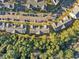 From above, condo buildings, lush trees, and parking areas are clearly visible at 4818 Innisbrook Ct. # 603, Myrtle Beach, SC 29579