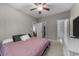 Spacious bedroom with a ceiling fan, neutral walls, and an ensuite bathroom at 4818 Innisbrook Ct. # 603, Myrtle Beach, SC 29579
