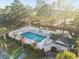 A beautiful community pool, perfect for enjoying a swim in the sun surrounded by gorgeous scenery at 4818 Innisbrook Ct. # 603, Myrtle Beach, SC 29579