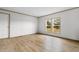 Simple bedroom with large windows and wood flooring at 5988 Pleasant View Church Rd., Nichols, SC 29581