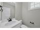 Bathroom featuring a white vanity, toilet, and a window with natural light at 604 Mccown Dr., Conway, SC 29526
