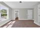 Bright bedroom with a view, carpet flooring, and access to an ensuite bathroom at 604 Mccown Dr., Conway, SC 29526