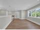 Bonus room with luxury vinyl flooring, white walls and trim, and large picture window at 604 Mccown Dr., Conway, SC 29526