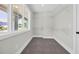 Walk-in closet with neutral carpet, a bright window, and shelving for optimal storage solutions at 604 Mccown Dr., Conway, SC 29526