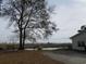 Waterfront view with benches and trees at 1412 Seagull Blvd., North Myrtle Beach, SC 29582