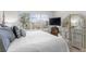 Bright main bedroom featuring a large window with views to the outside at 1969 Governors Landing Rd. # 224, Murrells Inlet, SC 29576