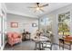 Cozy sunroom with a ceiling fan, comfortable seating and large windows offering natural light at 1969 Governors Landing Rd. # 224, Murrells Inlet, SC 29576