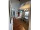 Bright dining room with hardwood floors and a charming chandelier at 233 Cloverleaf Dr., Longs, SC 29568