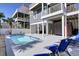Beautiful backyard with private pool and lounge area, ideal for relaxing and entertaining at 253 W Second Ave. S, Ocean Isle Beach, NC 28469