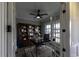 Charming office features a built-in bookshelf, black executive chair, and a large window at 3057 Moss Bridge Ln., Myrtle Beach, SC 29579