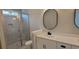 Elegant bathroom boasting a glass-enclosed shower, modern vanity with sink, and stylish fixtures at 681 Hawthorn Dr., Pawleys Island, SC 29585