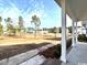 View of the lawn and nearby homes from the covered patio area at 718 Macon Alley, Myrtle Beach, SC 29588