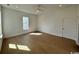 Bright living room with hardwood floors, recessed lighting, and a large window at 718 Macon Alley, Myrtle Beach, SC 29588