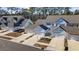 Aerial view of townhouses with attached garages and landscaping at 2523 Blue Crane Circle # 102, Myrtle Beach, SC 29577