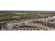 Aerial view of a neighborhood with houses and a pond at 2523 Blue Crane Circle # 102, Myrtle Beach, SC 29577