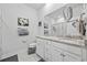 Double vanity bathroom with granite countertops and a walk-in shower at 2523 Blue Crane Circle # 102, Myrtle Beach, SC 29577