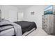 Main bedroom with a bed, dresser, and access to a bathroom at 2523 Blue Crane Circle # 102, Myrtle Beach, SC 29577