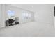 Spacious bonus room with carpeting, large windows, and a workspace at 2523 Blue Crane Circle # 102, Myrtle Beach, SC 29577