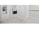 Carpeted hallway leading to bedrooms with a glimpse of one at 2523 Blue Crane Circle # 102, Myrtle Beach, SC 29577