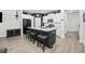 Modern kitchen with island, granite counters and stainless steel appliances at 2523 Blue Crane Circle # 102, Myrtle Beach, SC 29577