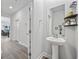 Clean powder room with pedestal sink and modern fixtures at 2523 Blue Crane Circle # 102, Myrtle Beach, SC 29577