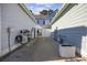 View of the alley between townhouses with utilities and landscaping at 2523 Blue Crane Circle # 102, Myrtle Beach, SC 29577