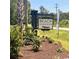 Beach Gardens community sign, surrounded by lush landscaping, welcomes residents and visitors at 323 Palmetto Sand Loop, Conway, SC 29527