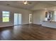 Spacious living room with hardwood floors, great light and a kitchen at 323 Palmetto Sand Loop, Conway, SC 29527