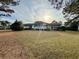Captivating rear exterior with a large deck and expansive backyard, perfect for outdoor living at 3774 Annandale Dr., Myrtle Beach, SC 29577