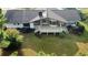 Drone shot of home with large back deck perfect for entertaining and enjoying the landscaped lawn at 3774 Annandale Dr., Myrtle Beach, SC 29577