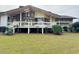 Expansive backyard view featuring a large deck, perfect for outdoor entertaining and relaxation at 3774 Annandale Dr., Myrtle Beach, SC 29577