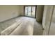 Bedroom with neutral carpet, large window, and ensuite bathroom at 3774 Annandale Dr., Myrtle Beach, SC 29577